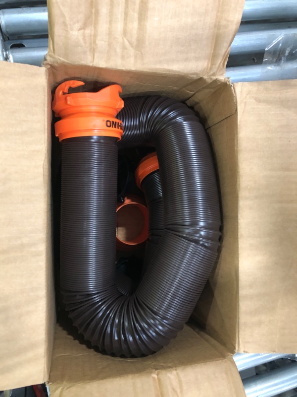 Photo 1 of Camco RhinoFLEX RV Sewer Hose Kit with Swivel Transparent Elbow and 4-in-1 Dump Station Fitting, Brown, 15 Feet (39770) 15ft Sewer Hose Kit Frustration-Free Packaging