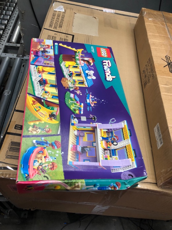 Photo 2 of *NEW* LEGO Friends Dog Rescue Centre 41727, Pet Animal Playset for Kids Ages 7 Plus Years Old with 2023 Series Characters Autumn and Zac Mini-Dolls, Toy Vet Set Standard Packaging