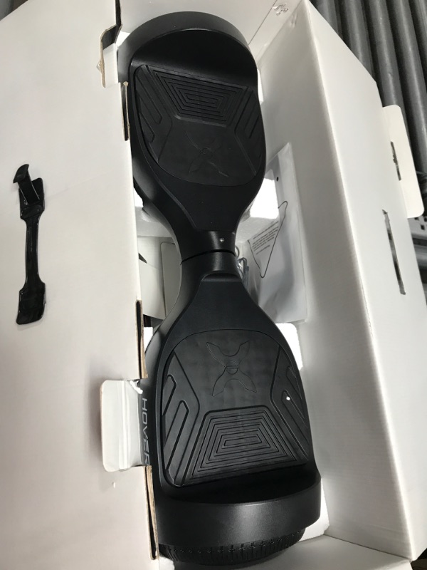 Photo 2 of [FOR PARTS, READ NOTES]
Hover-1 Drive Electric Hoverboard | 7MPH Top Speed, 3 Mile Range, Long Lasting Lithium-Ion Battery, 6HR Full-Charge, Path Illuminating LED Lights Black