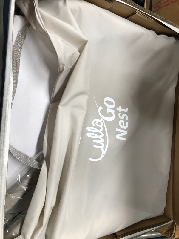 Photo 1 of Chicco LullaGo Nest Portable Bassinet - Dove