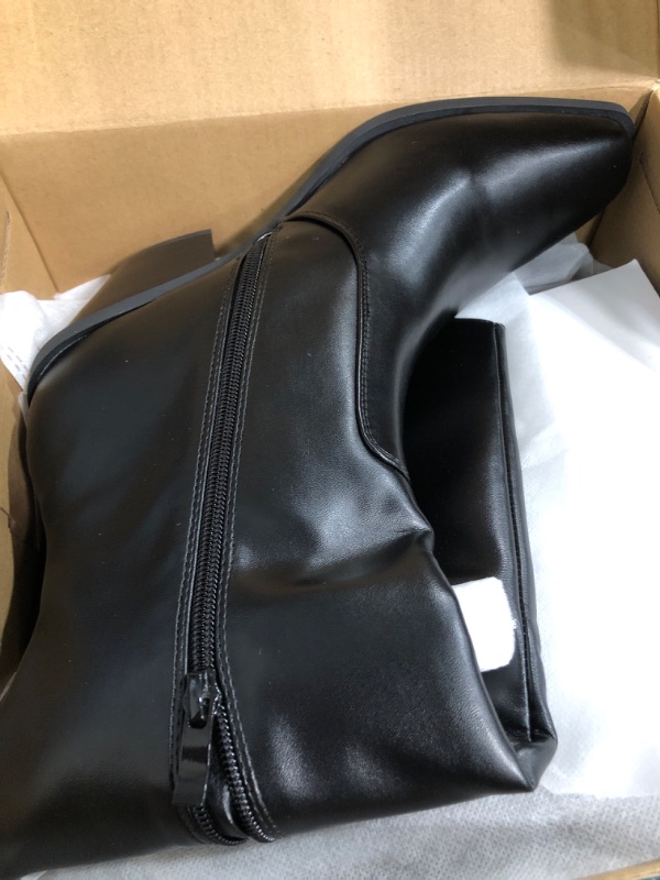 Photo 1 of woman's black boots size 9