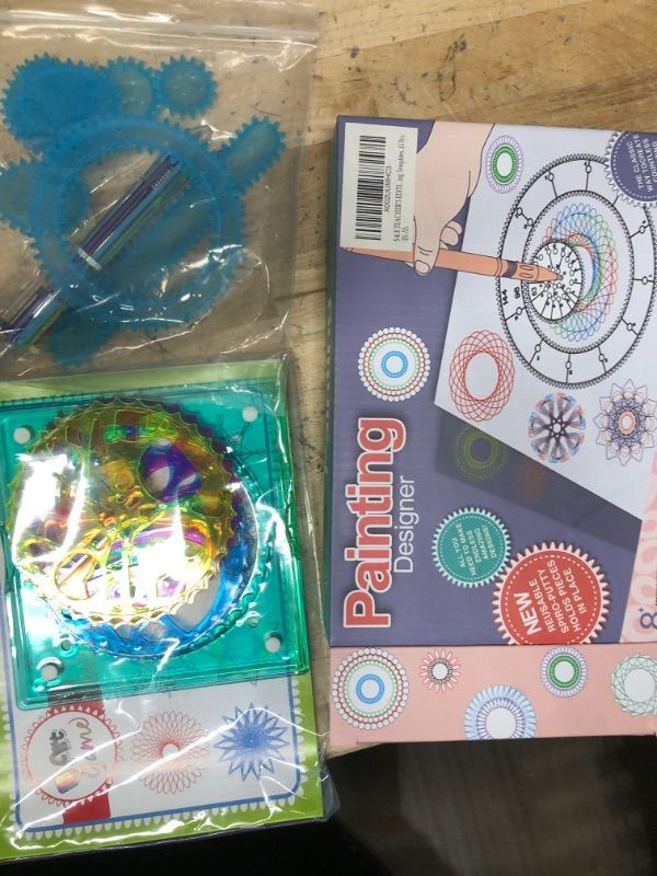 Photo 2 of ArtCreativity Spiral Drawing Art Set for Kids - 7 Piece Kit - Includes 6-in-1 Color Pen, Drawing Templates and Sketching Pad - Unique Arts and Craft Supplies - Great Gift for Boys and Girls