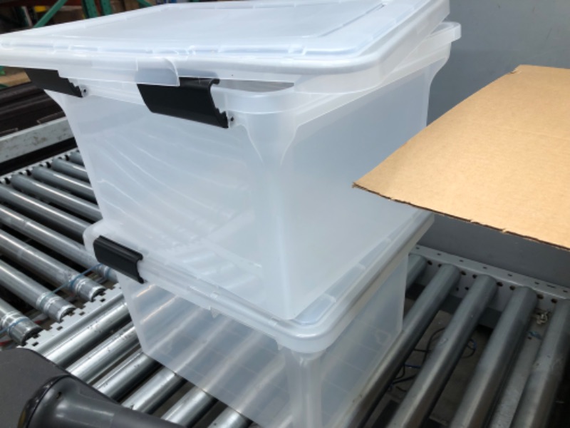 Photo 1 of **DAMAGE**IRIS USA 32 Quart WEATHERPRO Letter Size Portable File Box, Plastic Storage Container with Durable Lid and Seal and Secure Latching Buckles, Weathertight, Clear with Black Buckles, 4 Pack 32 Qt - 4 Pack