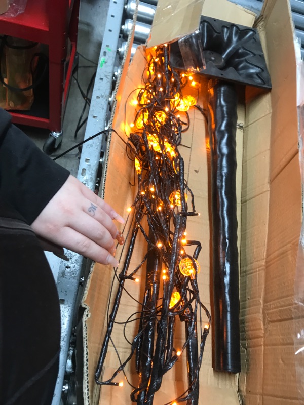 Photo 1 of TURNMEON 5 FT Prelit Halloween Willow Tree Decor with Timer, 108 Led & Pumpkin Lights Glittered Spooky Black Artificial Tree Scary Ornaments Halloween Decorations Indoor Outdoor Home(Plug in/4 Stakes)