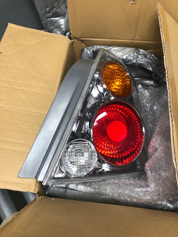 Photo 2 of Dorman 1611119 Passenger Side Tail Light Assembly Compatible with Select Nissan Models