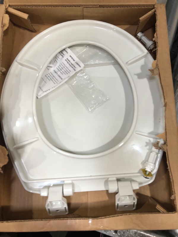 Photo 2 of **USED & Missing some hardware**
MAYFAIR 880SLOW 000 Caswell Toilet Seat will Slowly Close and Never Loosen, ROUND, Long Lasting Plastic, White & Fluidmaster 7115 Replacement Toilet Bolt Caps In White 1 Pack - ROUND Toilet Seat + Bolt Caps