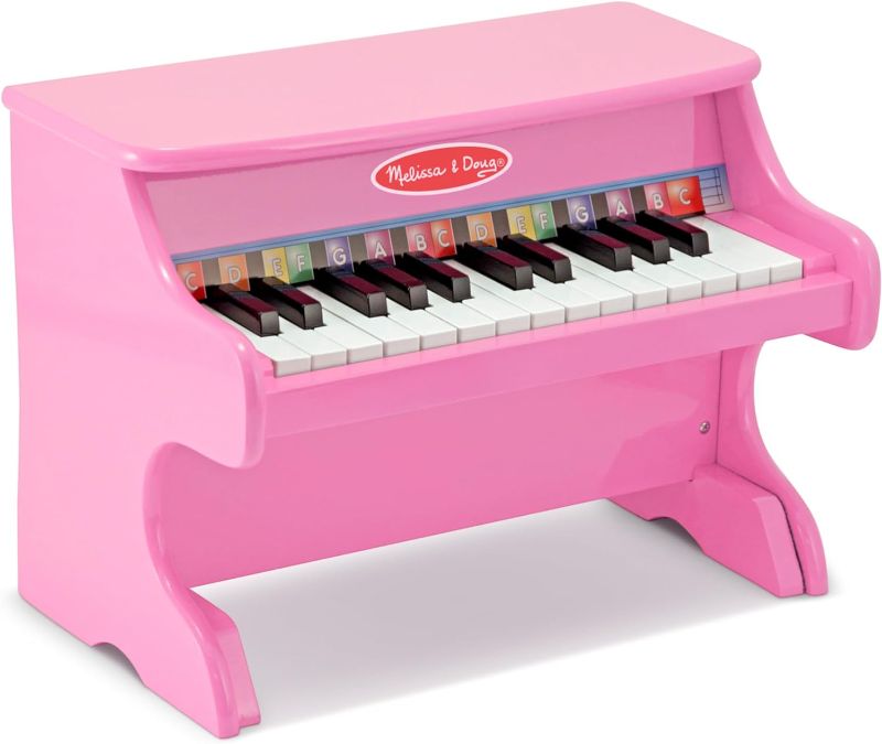 Photo 1 of 
Melissa & Doug Learn-to-Play Pink Piano With 25 Keys and Color-Coded Songbook - Baby Piano, Kids Piano Toy, Toddle