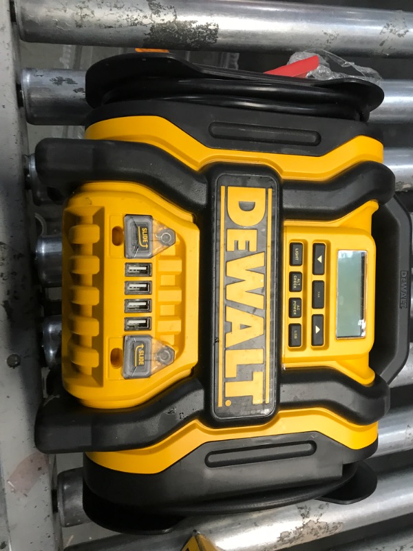 Photo 2 of DEWALT DXAEPS14 1600 Peak Battery Amp 12V Automotive Jump Starter/Power Station with 500 Watt AC Power Inverter, 120 PSI Digital Compressor, and USB Power , Yellow