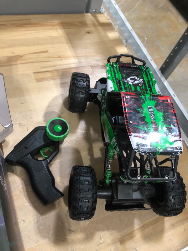 Photo 2 of DOUBLE E RC Car 1:12 Remote Control Car Monster Trucks with Head Lights 4WD Off All Terrain RC Car Rechargeable Vehicles Green