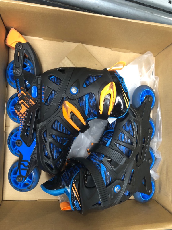 Photo 2 of **MINOR WEAR & TEAR**Roller Derby Tracer Boy's Adjustable Inline Medium (2-5) Black/Blue/Orange Tracer