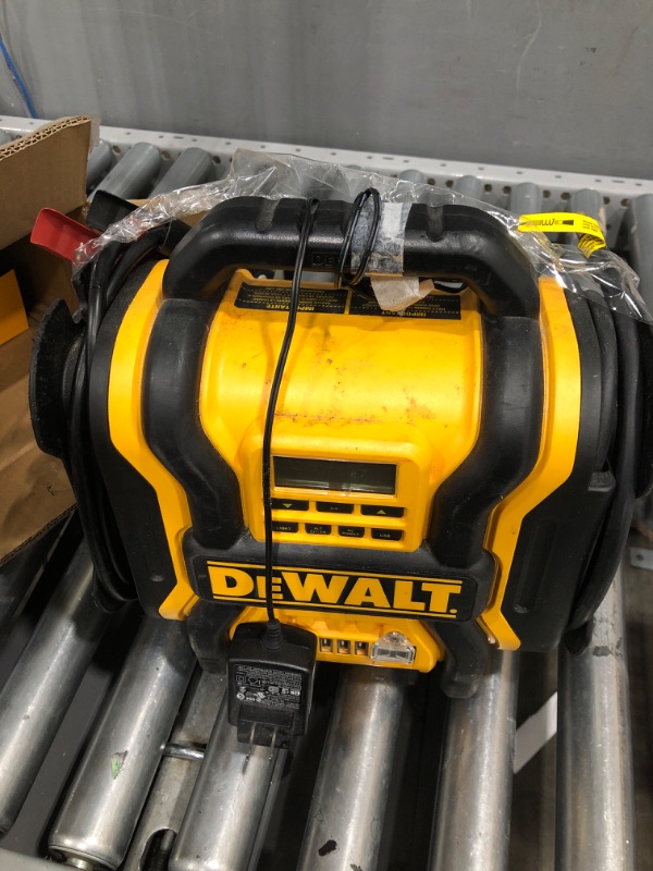 Photo 2 of DEWALT DXAEPS14 1600 Peak Battery Amp 12V Automotive Jump Starter/Power Station with 500 Watt AC Power Inverter, 120 PSI Digital Compressor, and USB Power , Yellow