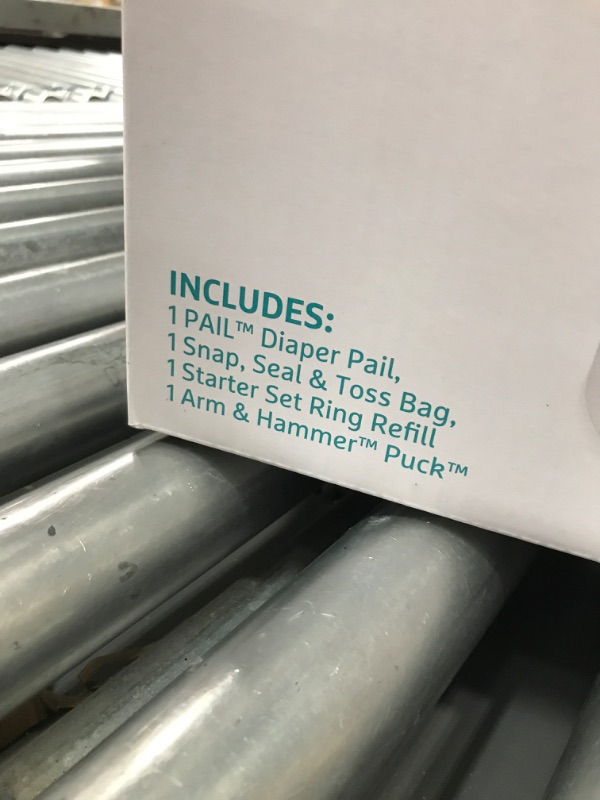 Photo 3 of 
Munchkin® Step Diaper Pail Powered by Arm & Hammer, #1 in Odor Control, Award-Winning, Includes 1 Refill Ring and 1 Snap, Seal & toss Bag