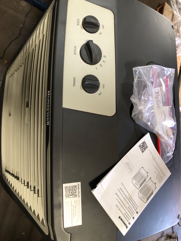 Photo 1 of **REVIEW NOTES* Honeywell 2669 CFM Outdoor Portable Evaporative Cooler & Fan, 33 Ft Air Throw for Large Outdoor Spaces, CO610PM, Black