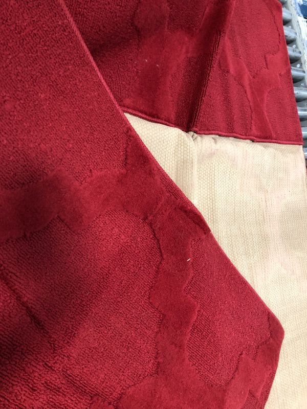 Photo 1 of 5x7 ft burgundy rug