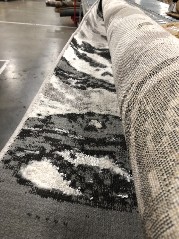 Photo 1 of 8 ft white black and grey rug 