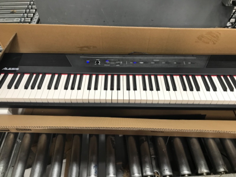 Photo 1 of *see notes* Alesis Recital – 88 Key Digital Piano Keyboard with Semi Weighted Keys, 2x20W Speakers, 5 Voices, Split, Layer and Lesson Mode, FX and Piano Lessons Recital Piano Only