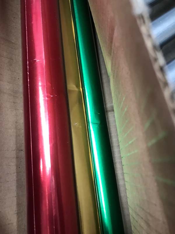 Photo 2 of Hallmark Foil Holiday Wrapping Paper with Cut Lines on Reverse (3 Rolls: 60 sq. ft. ttl) Solid Red, Green, Gold Red, Green, Gold Solid