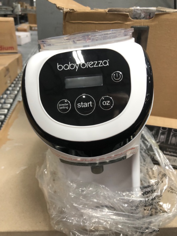 Photo 4 of Baby Brezza Formula Pro Mini Baby Formula Maker – Small Baby Formula Mixer Machine Fits Small Spaces and is Portable for Travel– Bottle Makers Makes The Perfect Bottle for Your Infant On The Go Formula Pro Mini Dispenser Machine