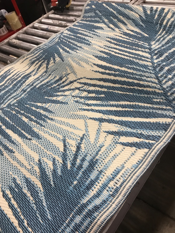 Photo 2 of (USED) Rugshop Tropical Floral Reversible Crease-Free Waterproof Premium Recycled Plastic Outdoor Rugs for Patio,Backyard,RV,Deck,Picnic,Trailer,Beach,Camping Blue 3' x 5' 3' x 5' Blue