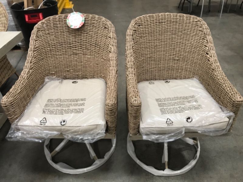 Photo 1 of unassembled **allen + roth Riverpointe Set of 2 Wicker Brown Aluminum Frame Swivel Dining Chair(s) with Tan Cushioned Seat