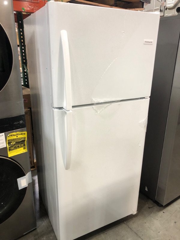 Photo 2 of DENTED FRONT; LIKE NEW**Frigidaire 20.5-cu ft Top-Freezer Refrigerator (White)