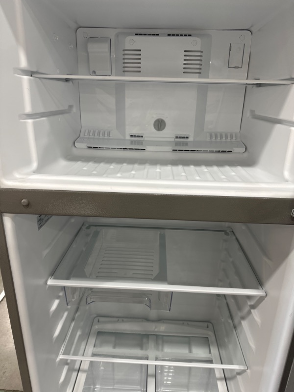 Photo 6 of  DENTED SIDE**Whirlpool 17.6-cu ft Top-Freezer Refrigerator (Monochromatic Stainless Steel)