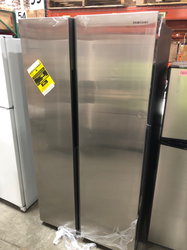 Photo 3 of DENTED FRONT DOOR**Samsung 28-cu ft Smart Side-by-Side Refrigerator with Ice Maker (Fingerprint Resistant Stainless Steel)