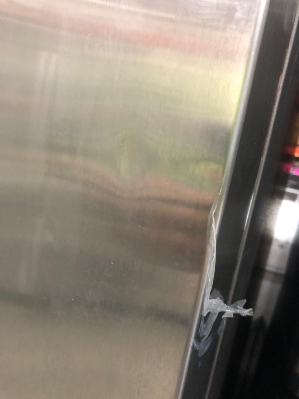 Photo 2 of DENTED FRONT DOOR**Samsung 28-cu ft Smart Side-by-Side Refrigerator with Ice Maker (Fingerprint Resistant Stainless Steel)