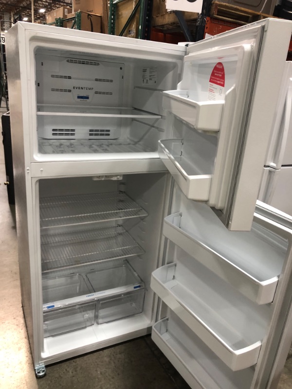Photo 2 of DENTED FRONT DOOR**Frigidaire Garage-Ready 18.3-cu ft Top-Freezer Refrigerator (White)