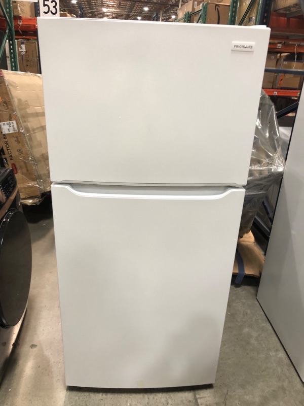 Photo 4 of DENTED FRONT DOOR**Frigidaire Garage-Ready 18.3-cu ft Top-Freezer Refrigerator (White)