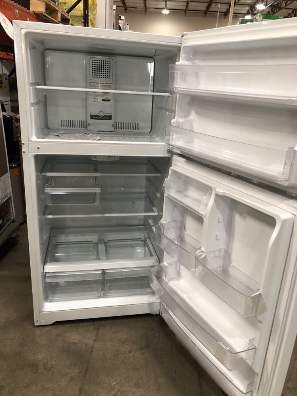 Photo 4 of GE Garage-ready 21.9-cu ft Top-Freezer Refrigerator (White)