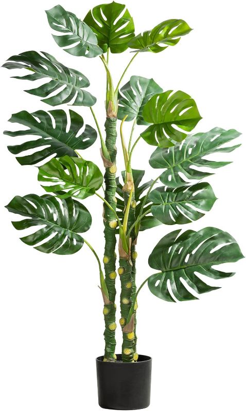 Photo 1 of *SIMILAR TO STOCK PHOTO* Mingfuxin 4ft Artificial Trees, 47.3" Faux Monstera Deliciosa Plant Potted, Fake Swiss Cheese Plant Tropical Monstera Palm Tree for Indoor and Outdoor Home Decoration
