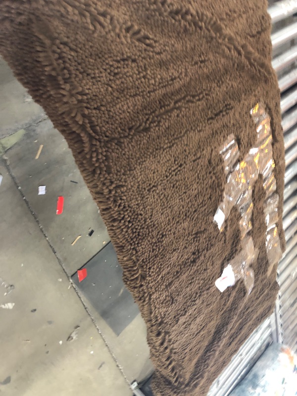 Photo 1 of 30" x 60" Brown rug