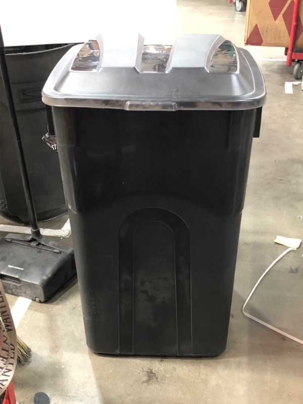 Photo 1 of  96-Gallons Black Plastic Wheeled Trash Can with Lid Outdoor

