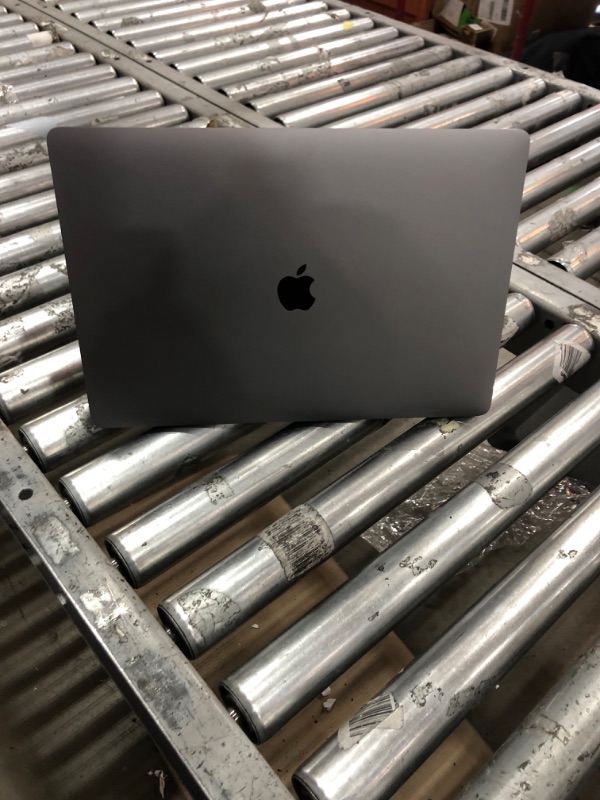 Photo 3 of 2019 Apple MacBook Pro with Intel Core i9 (16-inch, 16GB RAM, 1TB SSD Storage) Silver 
