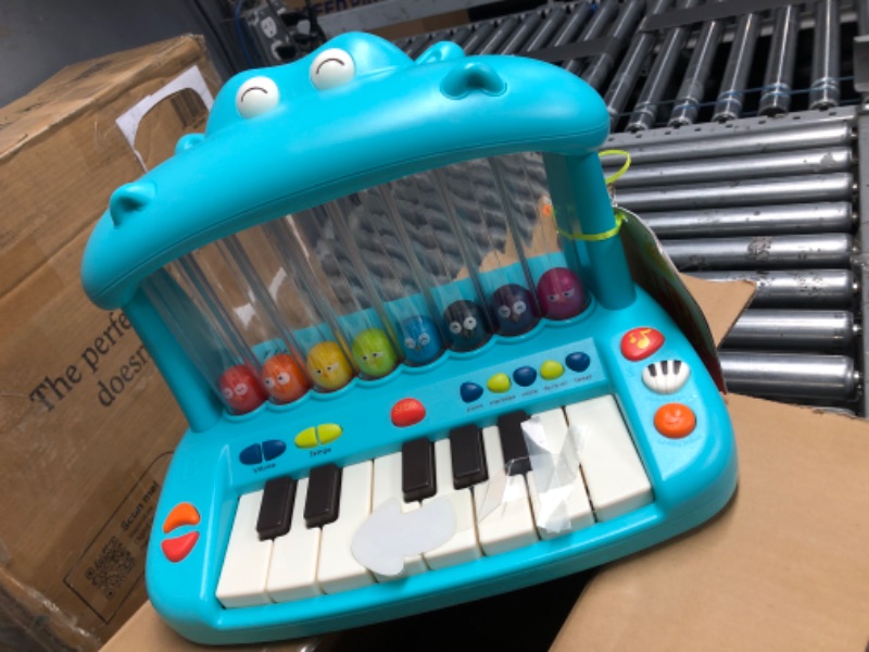 Photo 2 of B. toys- Hippo Pop- Musical Toy Keyboard – Play Piano – Songs, Sounds & Lights – Musical Instrument for Toddlers, Kids – 12 Months 