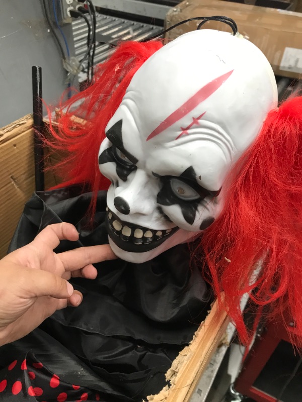 Photo 2 of Haunted Hill Farm Animatronic Pop-Up Two-Headed Clown with Light-Up Eyes for Battery Operated Scary Indoor or Covered Outdoor Halloween Decoration 6-FT Popup Clown