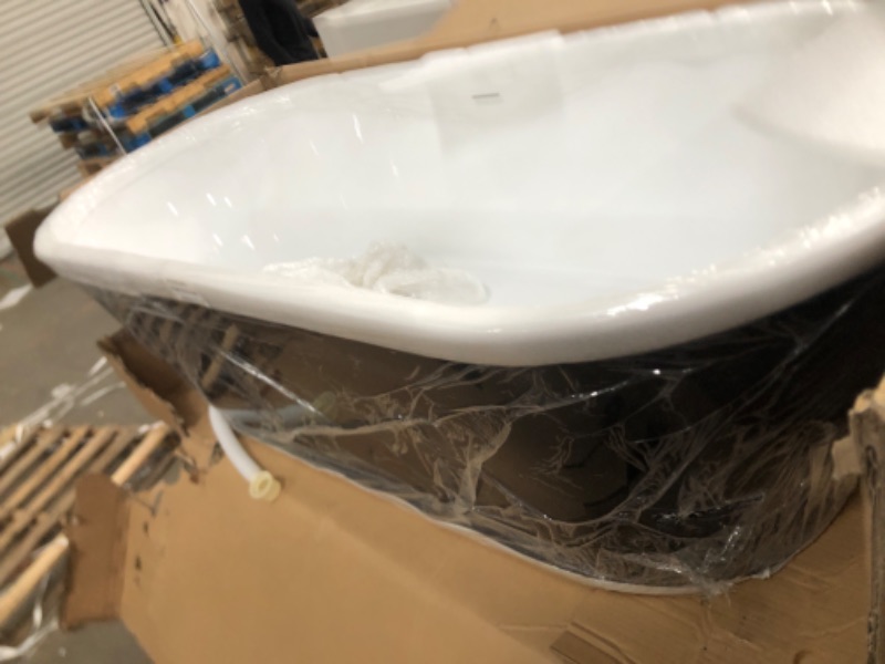 Photo 1 of *DAMAGED SIDE* 63.6 in. Acrylic Reversible Drain Oval Slipper Flatbottom Freestanding Bathtub in Black and White
