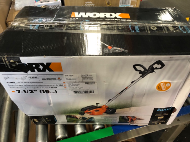 Photo 1 of WORX WG896 12 Amp 7.5" Electric Lawn Edger & Trencher, 7.5in, Orange and Black & AmazonBasics 16/3 Vinyl Outdoor Extension Cord | Orange, 100-Foot