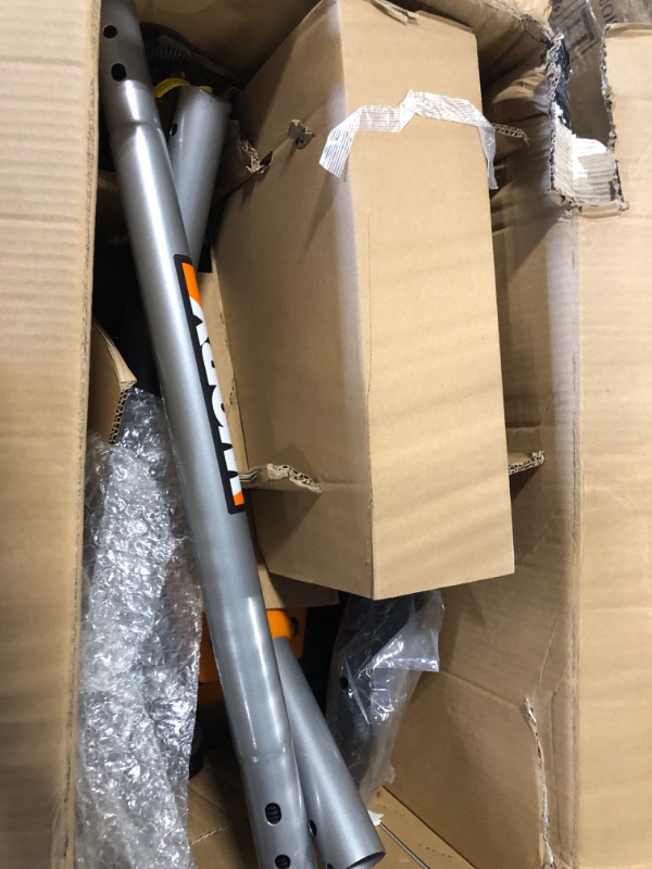 Photo 1 of WORX WG896 12 Amp 7.5" Electric Lawn Edger & Trencher, 7.5in, Orange and Black & AmazonBasics 16/3 Vinyl Outdoor Extension Cord | Orange, 100-Foot