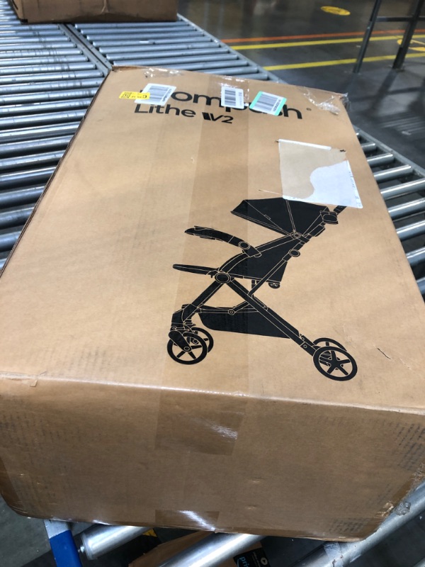 Photo 1 of Mompush Lithe V2 Lightweight Stroller + Snack Tray, Ultra-Compact Fold & Airplane Ready Travel Stroller, Near Flat Recline Seat, Cup Holder, Raincover & Travelbag Included Forest