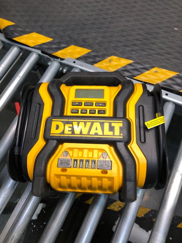 Photo 1 of DEWALT DXAEPS14 1600 Peak Battery Amp 12V Automotive Jump Starter/Power Station with 500 Watt AC Power Inverter, 120 PSI Digital Compressor, and USB Power , Yellow