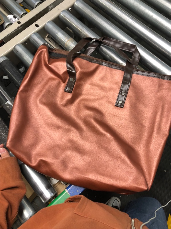 Photo 1 of Shimmering orange with brown  purse 