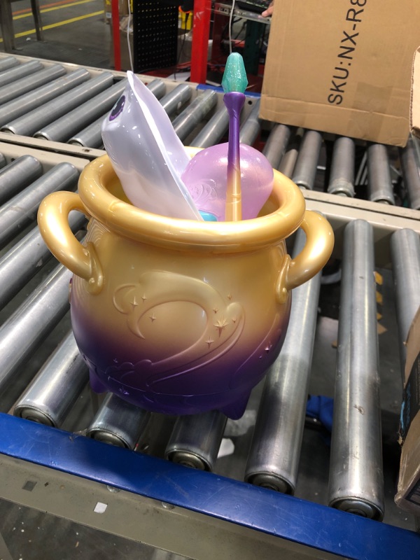 Photo 1 of Magic Mixies Magical Misting Cauldron with Interactive 8 inch Blue Plush Toy and 50+ Sounds and Reactions, Multicolor