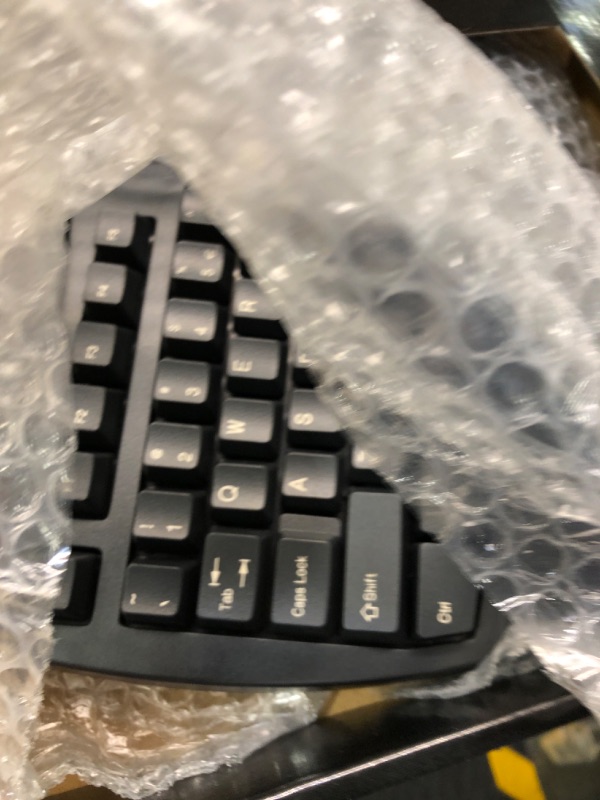 Photo 1 of Perixx Periboard-512 Ergonomic Split Keyboard - Natural Ergonomic Design - Black - Bulky Size 19.09"x9.29"x1.73", US English Layout Wired Black Keyboard