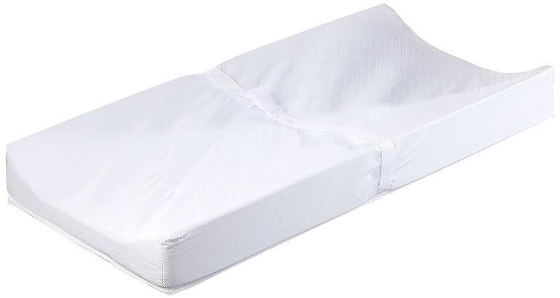 Photo 1 of Colgate Mattress 2-Sided Contour - GREENGUARD Gold Certified Changing Pad Featuring Firm Foam Ridges for Support, Ridgid Fingerboard Support Board, and Safety Strap