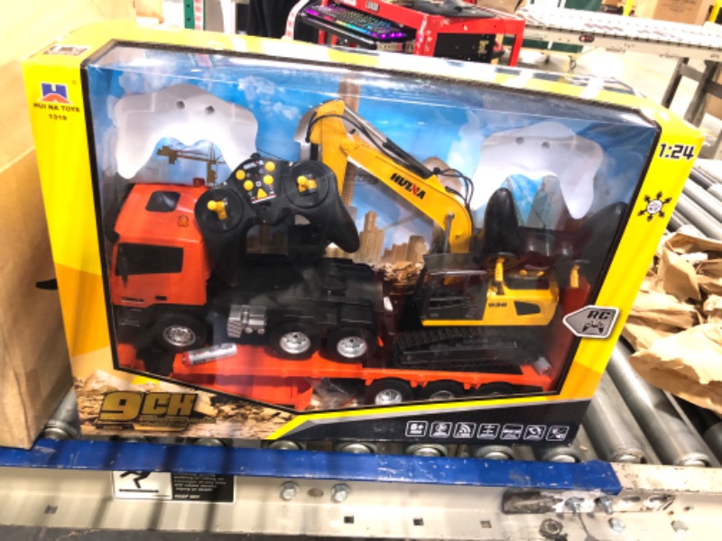 Photo 3 of Fistone RC Semi Truck & Excavator Toy Set, 2.4Ghz Remote Control Flatbed Truck with Excavator Toys, 1:24 RC Semi-Trailer Engineering Tractor with Sound and Lights, Construction Vehicles Toy for Boys