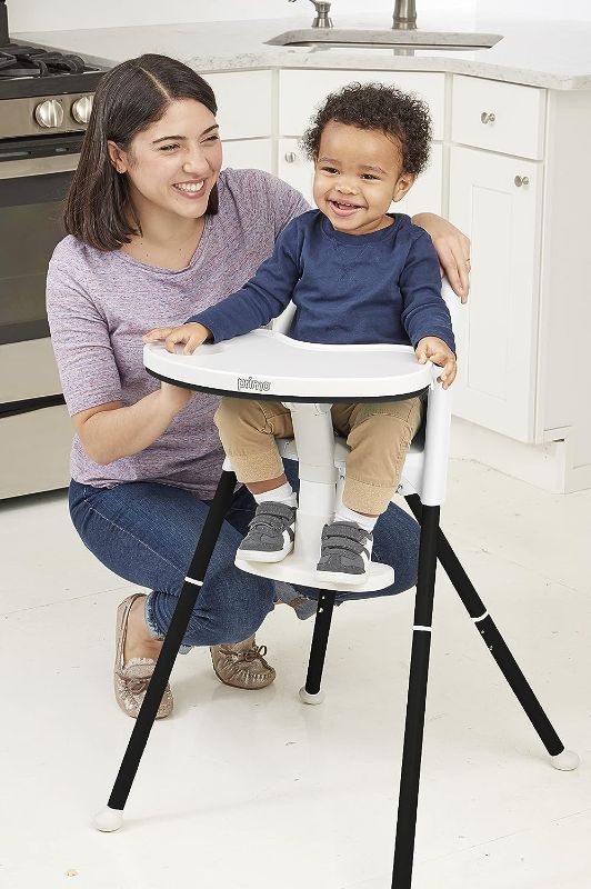 Photo 1 of FUNNY SUPPLY 3-in-1 Cute Folding High Chair, Perfect Modern Space Saving Highchair with Detachable Double Tray, 3-Point Harness, White White High Chair