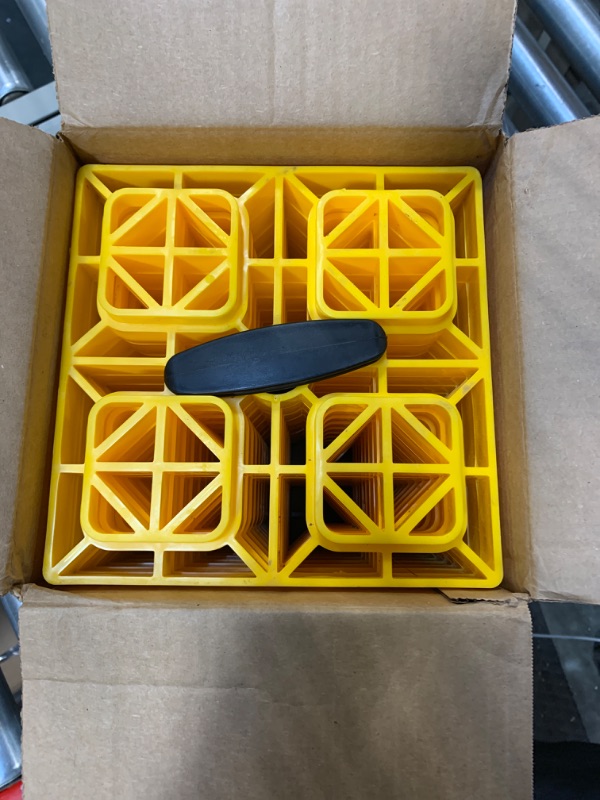 Photo 2 of Camco Fasten 2x2 Leveling Block for Single Tires-Interlocking Design Allows Stacking to Desired Height-Includes Secure T-Handle Carrying System-Yellow-10 Pack (21022) Yellow Single Tire Ships In Own Container