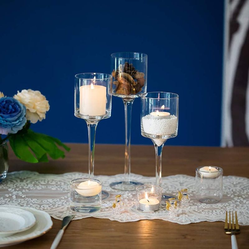 Photo 1 of 
Roll over image to zoom in





Nuptio Glass Candle Holder Tea Light Candle Holders Set of 3 Tall Tealight Candle Holder for Table Centerpiece Clear Candleholders for Pillar Candles Floating Candles Holder for Wedding Home Bathroom